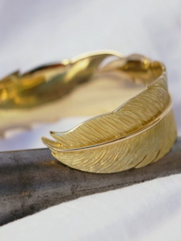 bracelet en or plume